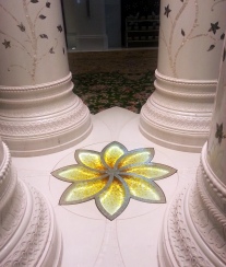 A close up of the star/flower design that adorns the Grand Mosque